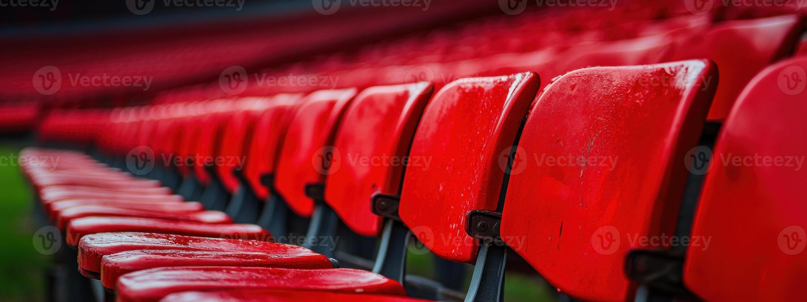 Vibrant Red Stadium Seats in Empty Arena. photo