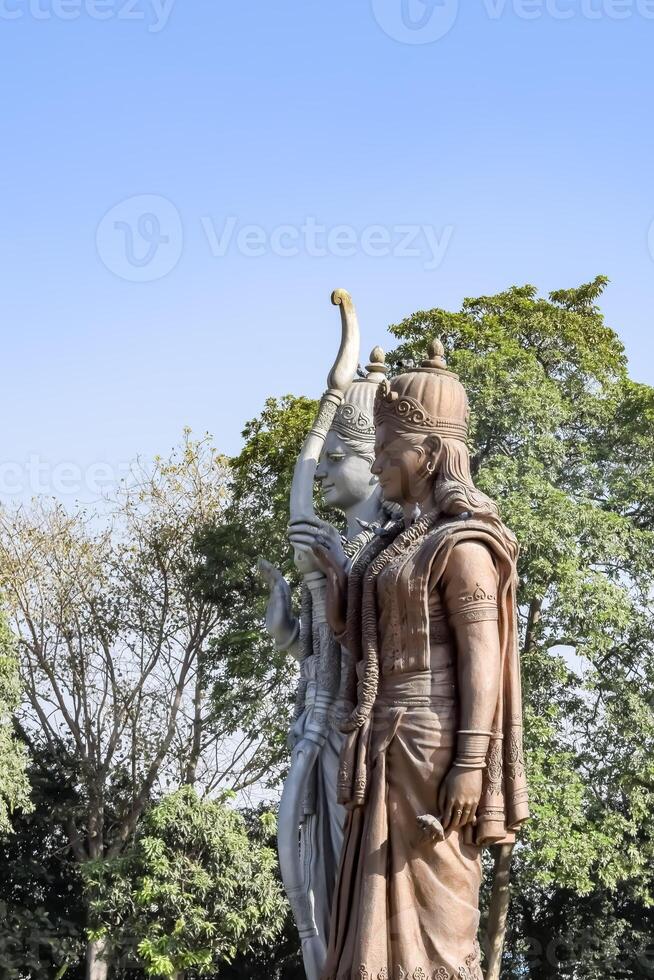 Big statue of Lord Sita Ram near Delhi International airport, Delhi, India, Lord Ram and Sita big statue touching sky at main highway Mahipalpur, Delhi photo