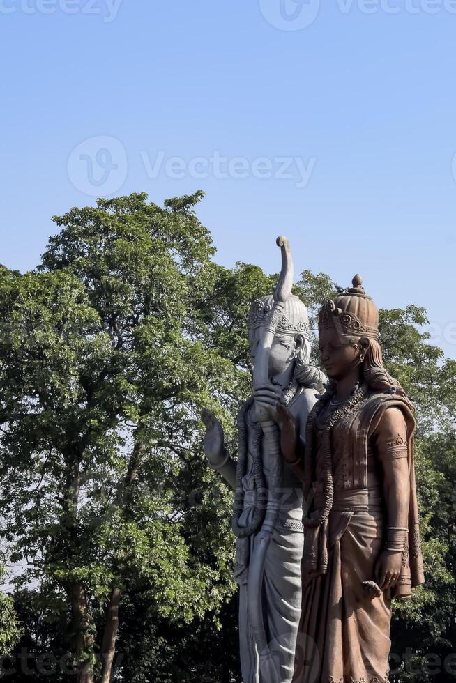 Big statue of Lord Sita Ram near Delhi International airport, Delhi, India, Lord Ram and Sita big statue touching sky at main highway Mahipalpur, Delhi photo