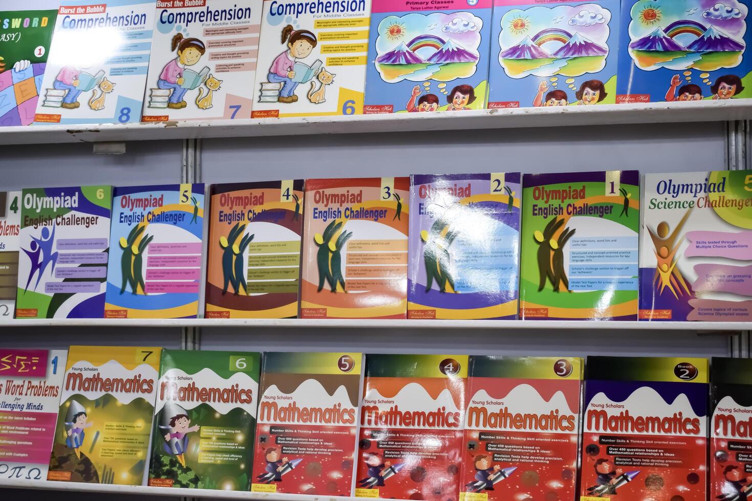 New Delhi, India, July 17 2024 - Variety of Books on shelf inside a book-stall at Delhi International Book Fair, Selection of books on display in Annual Book Fair at Bharat Mandapam complex photo