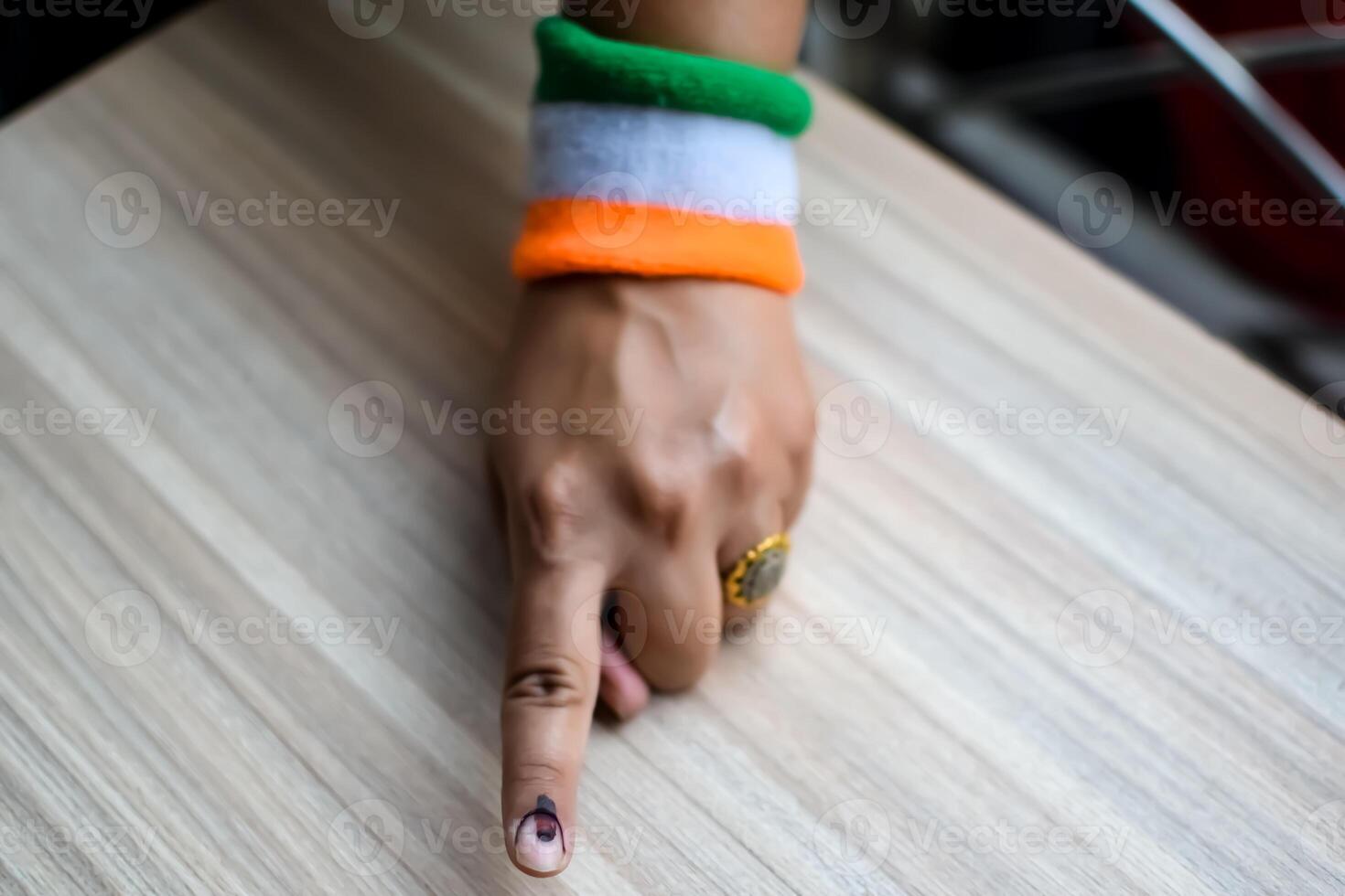 Young voter showing her ink-marked fingers after casting votes near polling booth of east Delhi, India for general Lok Sabha Elections 2024 photo