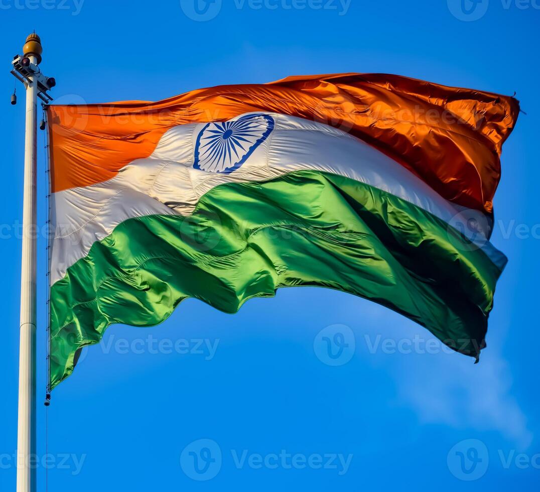 India flag flying high at Connaught Place with pride in blue sky, India flag fluttering, Indian Flag on Independence Day and Republic Day of India, tilt up shot, Waving Indian flag, Har Ghar Tiranga photo