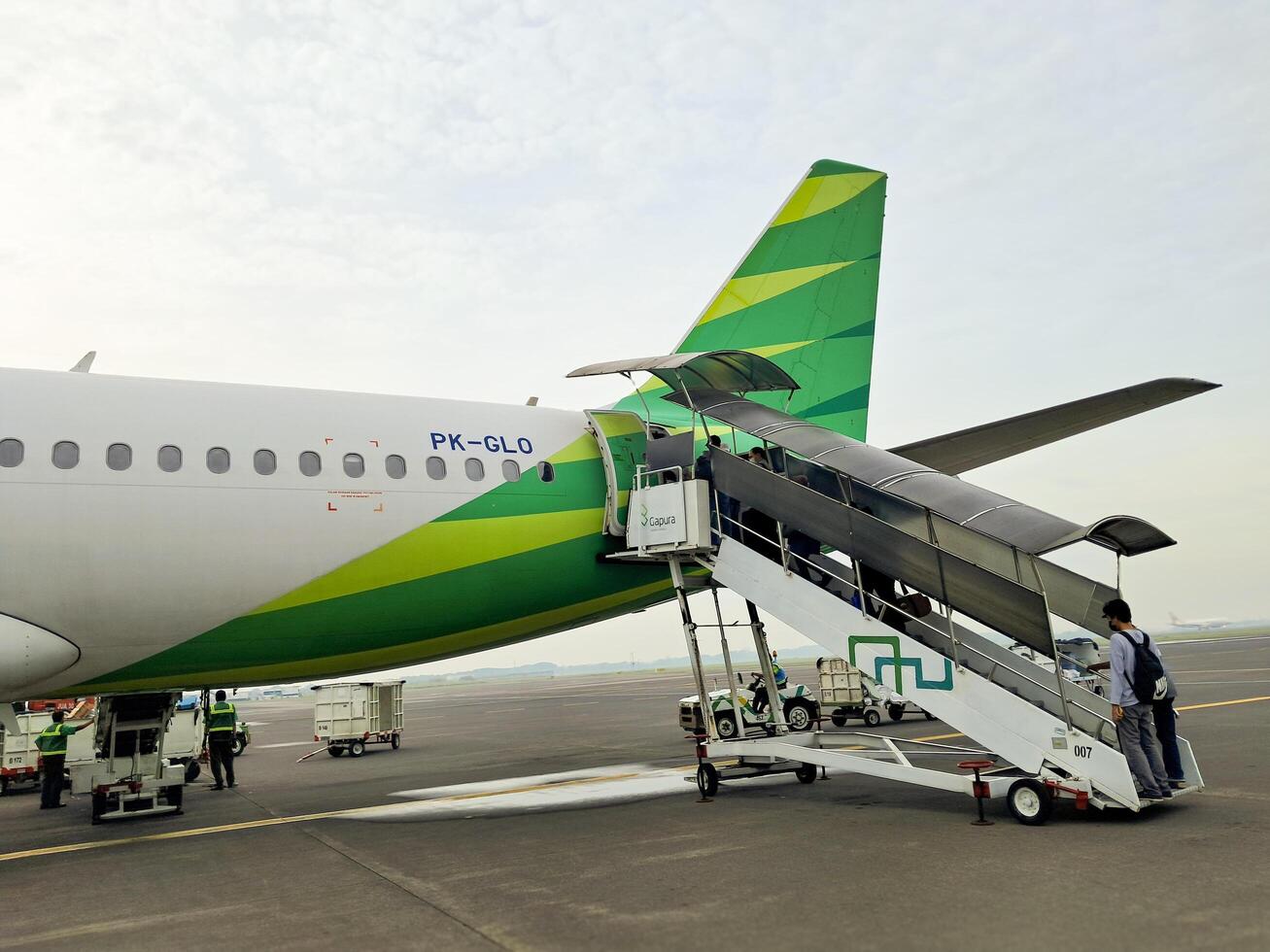 The Citilink plane is at the airport in Surabaya, July 03, 2024 photo