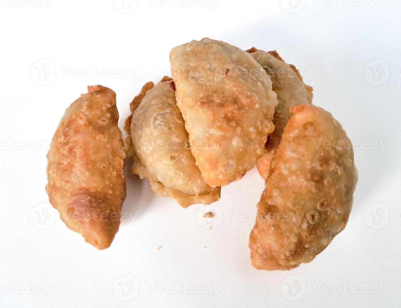 Food called Jalankote, typical of Makassar, South Sulawesi with a white background and delicious chili sauce photo
