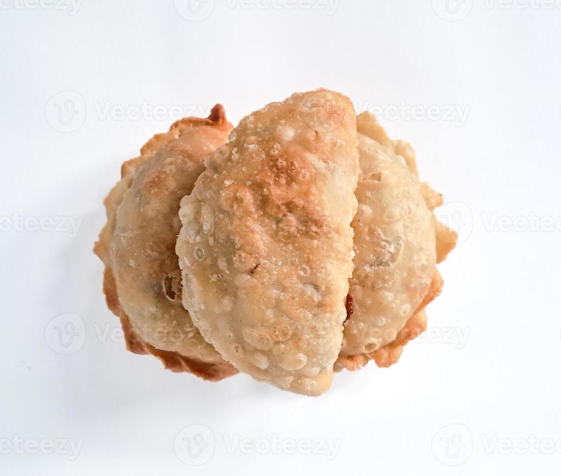 Food called Jalankote, typical of Makassar, South Sulawesi with a white background and delicious chili sauce photo