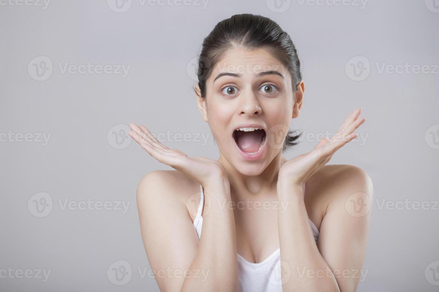 Good Looking Model Has A Surprised Expression On Her Face photo