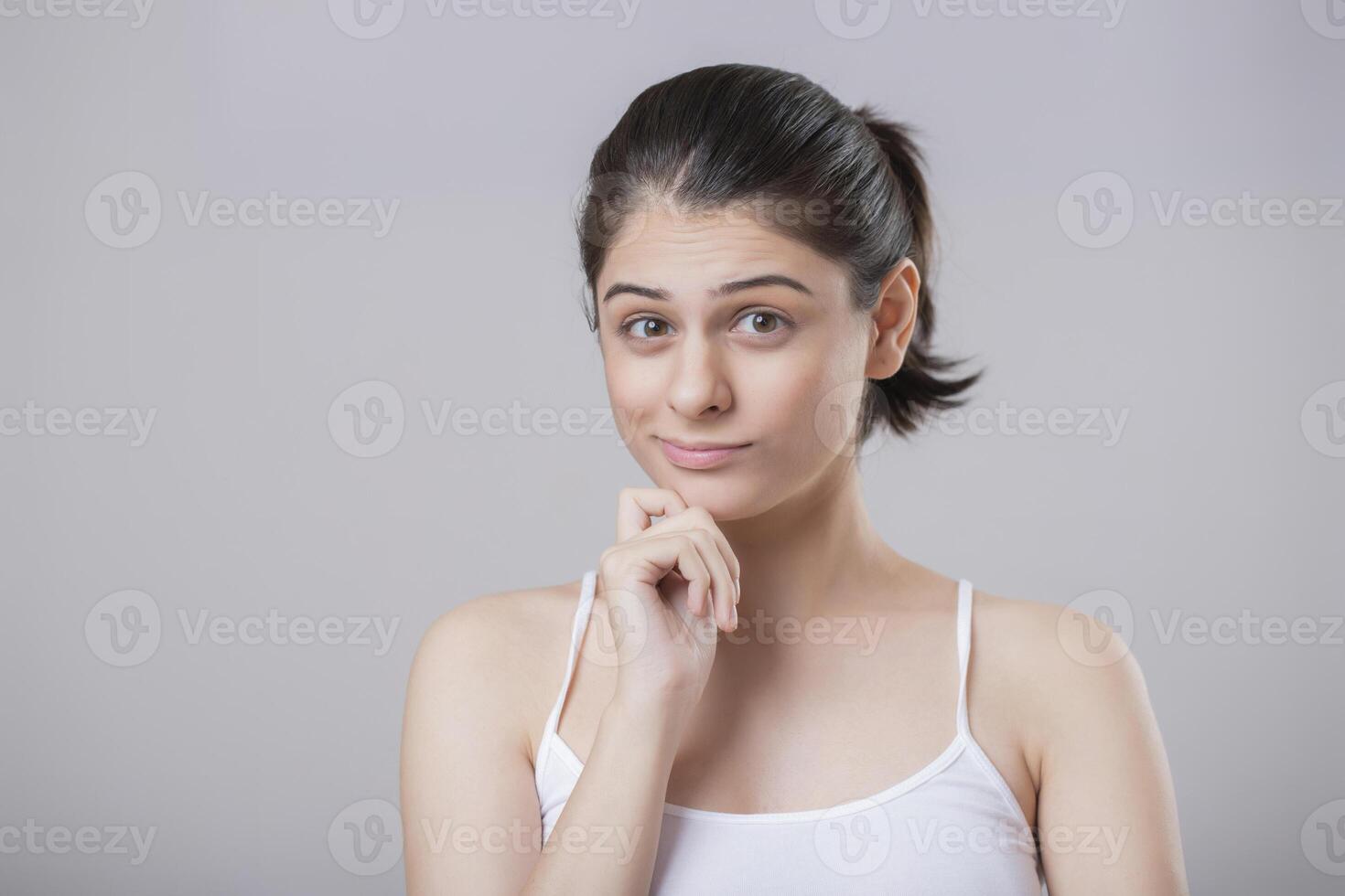 Glamour Model Thinking Something And Giving Thoughtful Expression photo