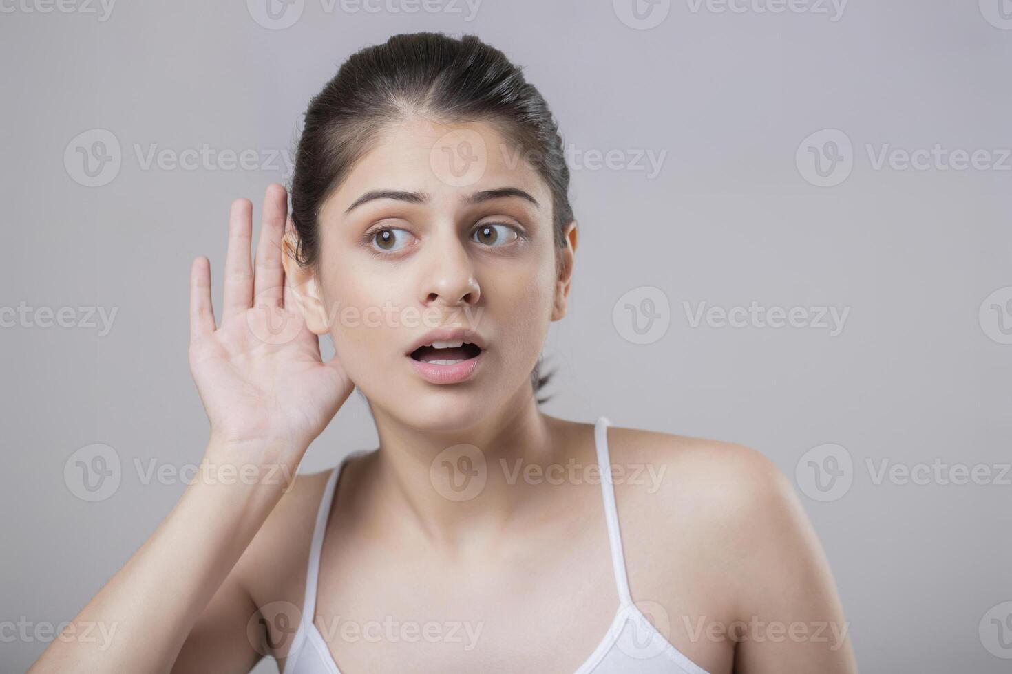 Close-up Portrait Of A Model Lady Listening Gossip photo