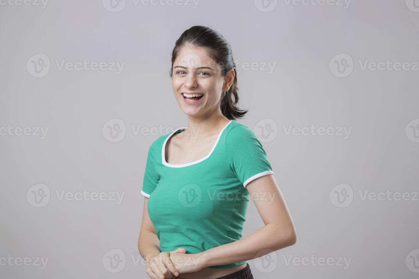 Appealing Woman Smiling And Looking At Front Camera photo