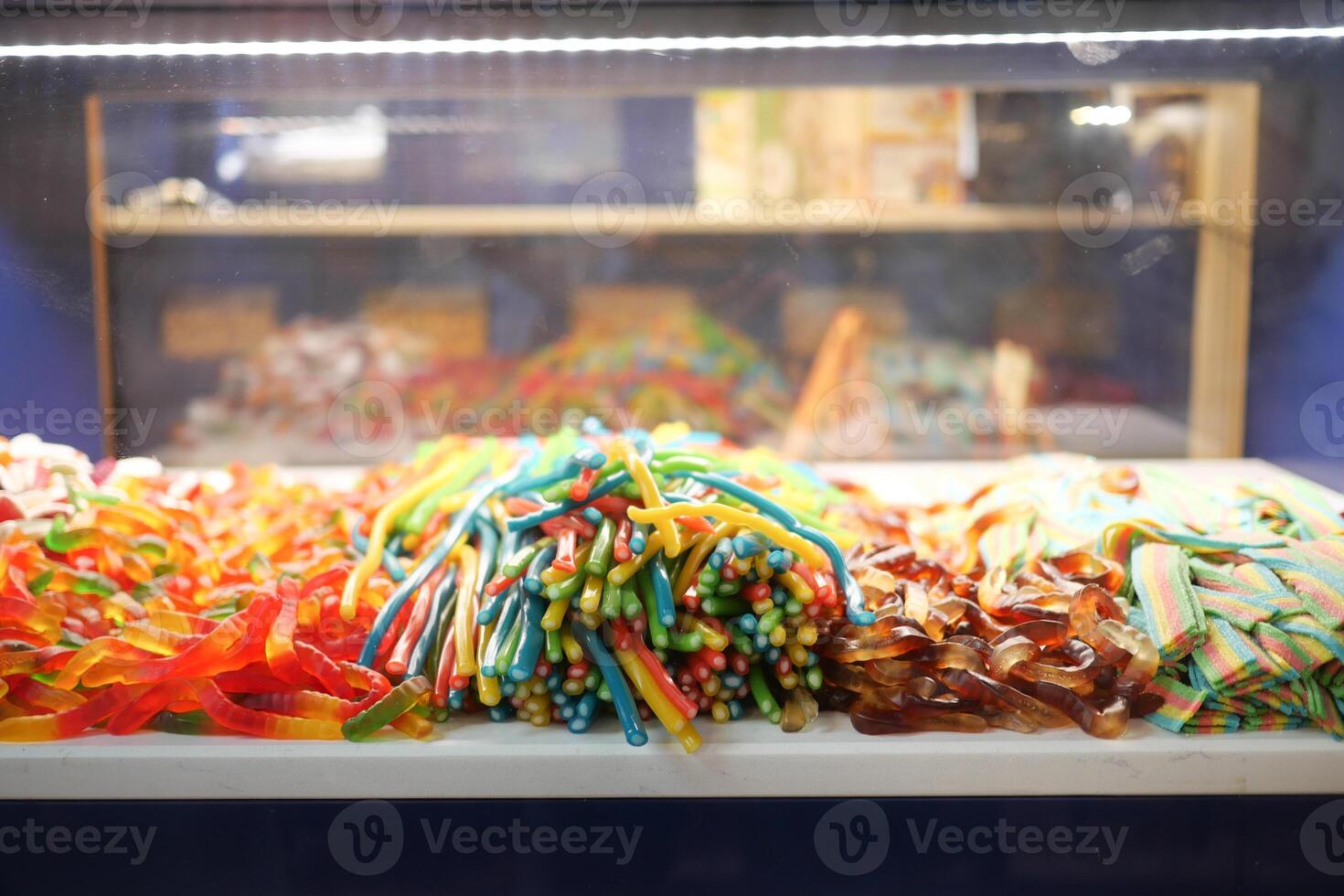 Mixed colorful jelly, gummy candies display for sales photo