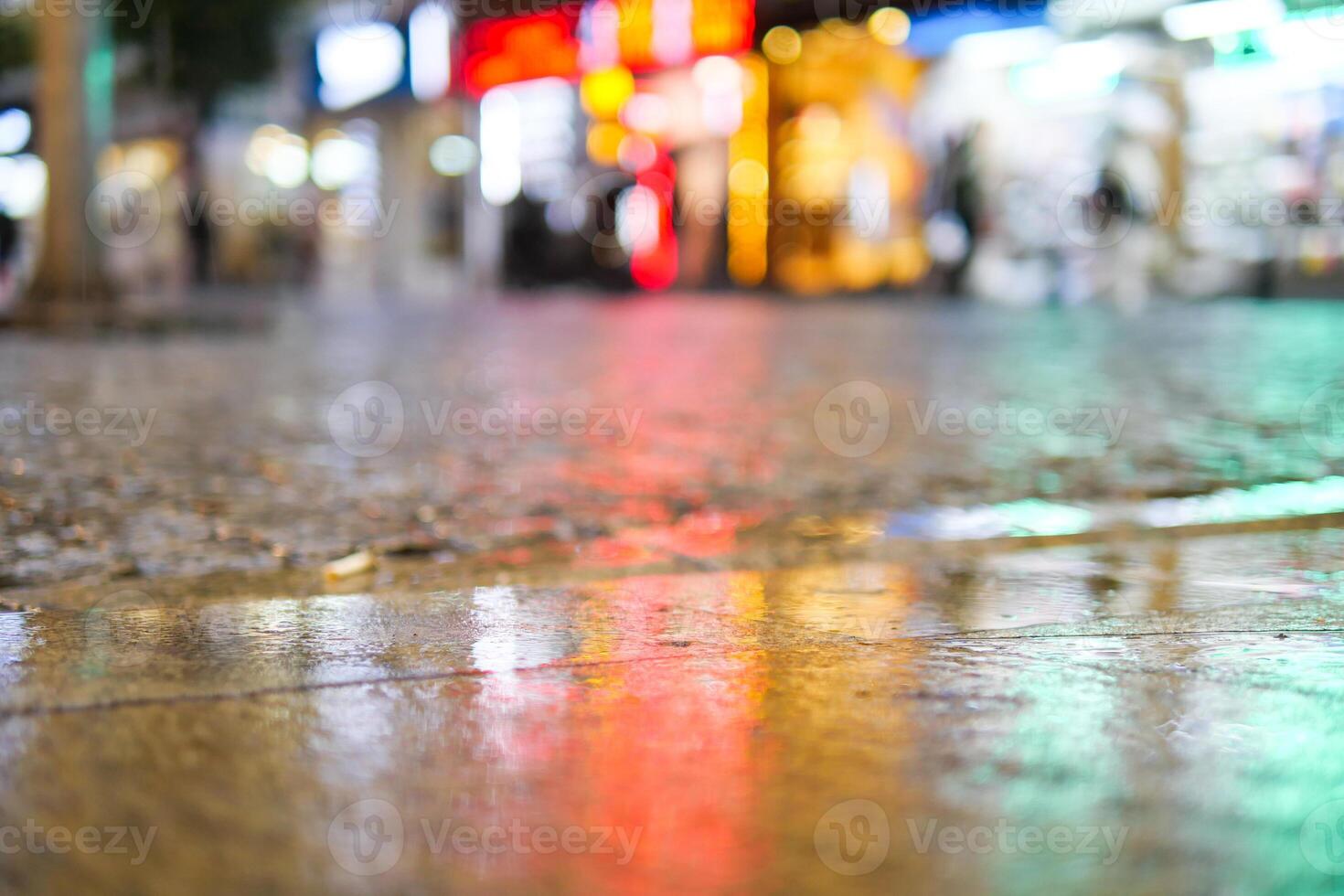 water drops on the rainy day. night view in the city, selective focus photo
