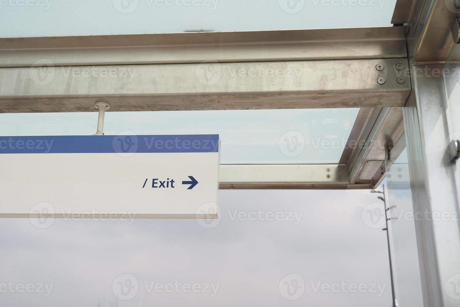Bright Exit Sign Clearly Indicating Direction at a Contemporary and Modern Transit Station photo