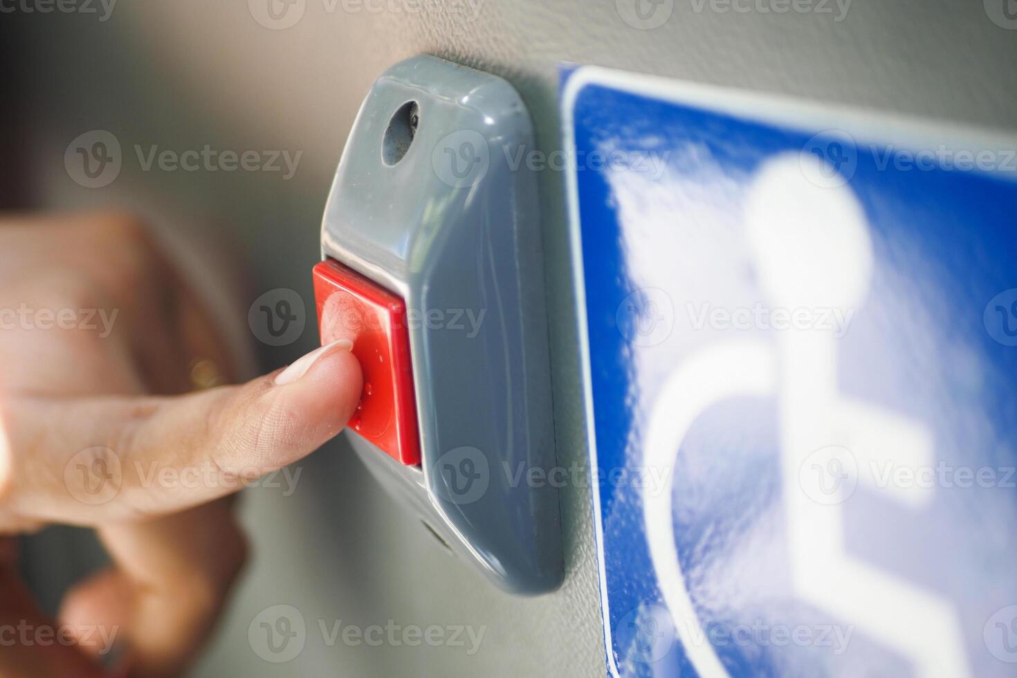 Closeup of Bus bell switch for stop inside the public bus photo