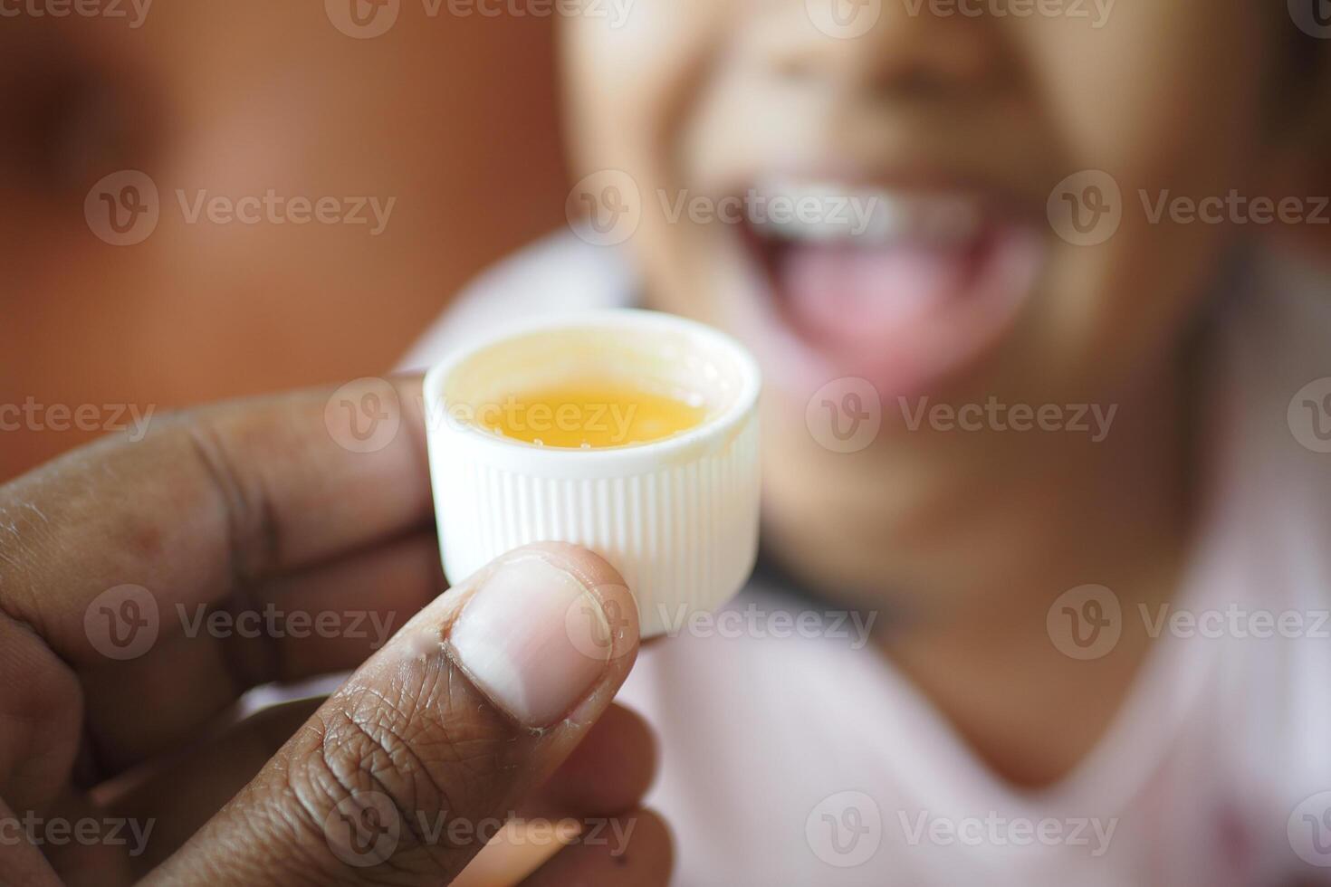 A dose of cough syrup. photo