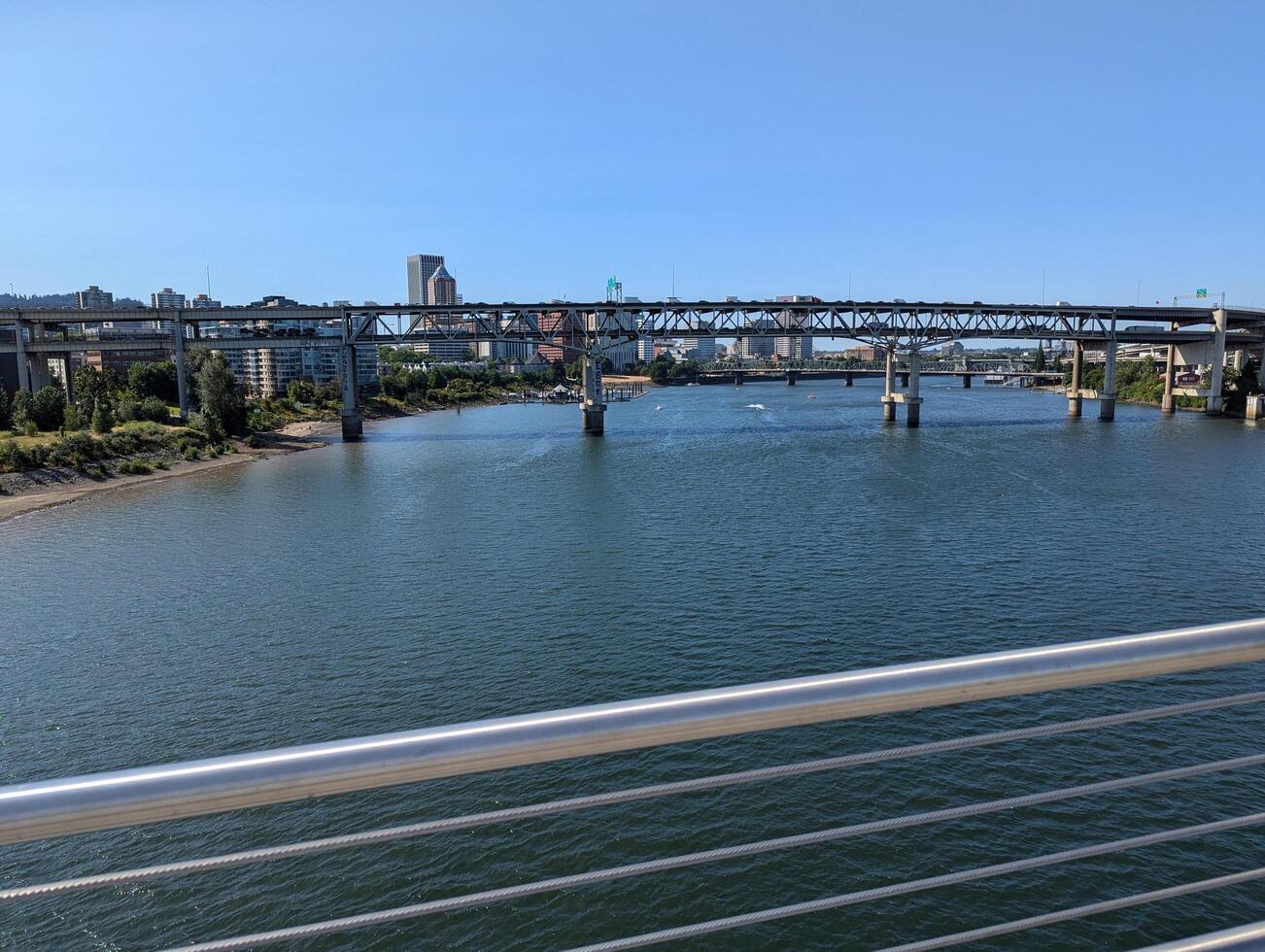 Portland, Oregon, USA - 07.11.2024 View from the Ross Island Bridge to the Marquam Bridge and the city photo