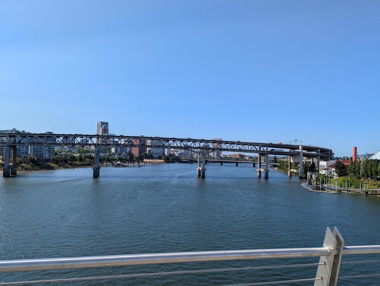 Portland, Oregon, USA - 07.11.2024 View from the Ross Island Bridge to the Marquam Bridge and the city photo