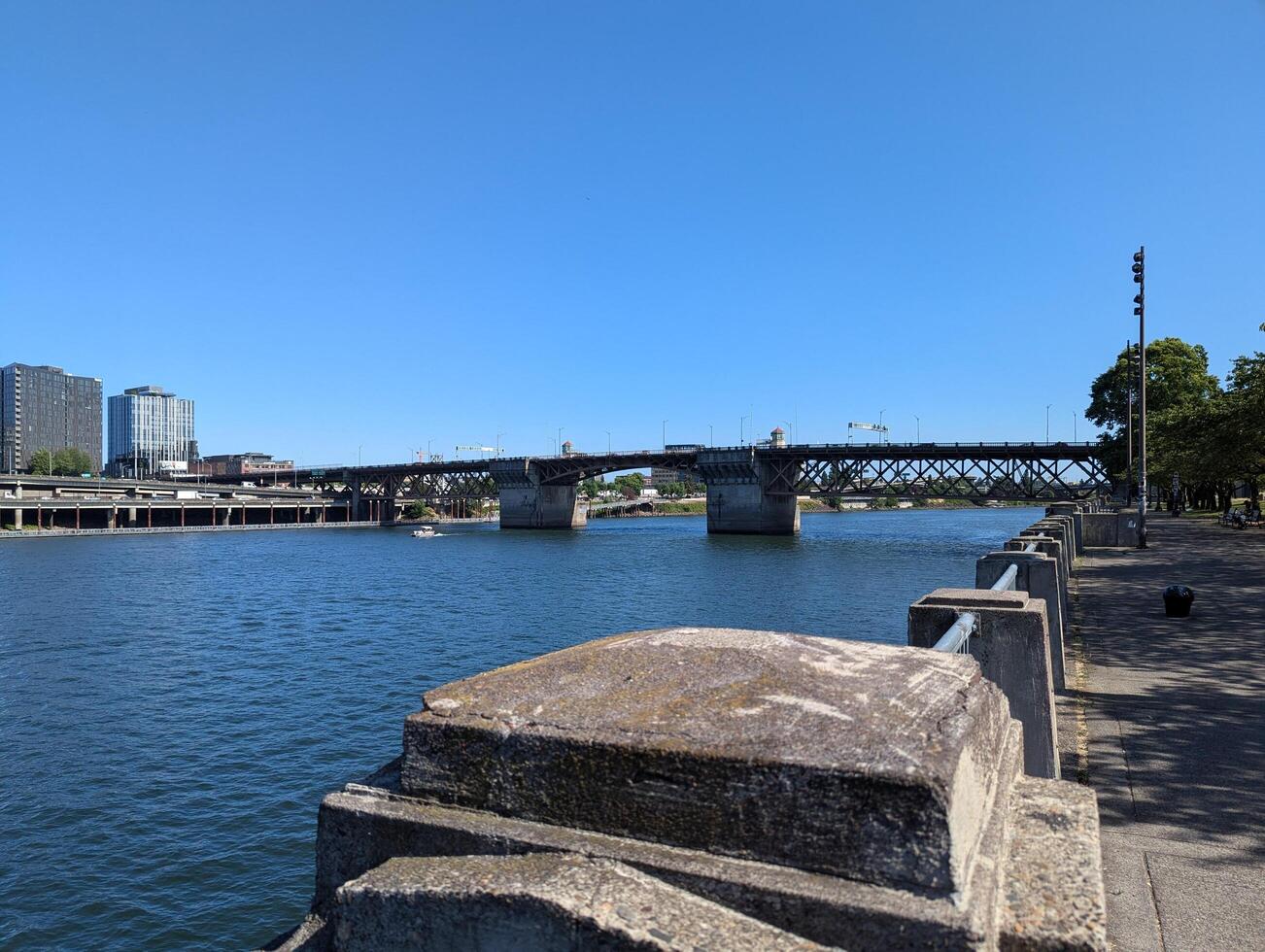 Portland, Oregon, USA - 07.10.2024 View of the Morrison Bridge across the Willamette River. Portland, Oregon, USA. photo