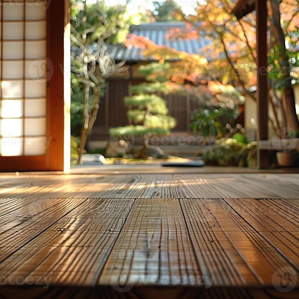 A peaceful Japanese garden framed by a traditional wooden floor and shoji screen, creating a serene and Zen atmosphere. photo