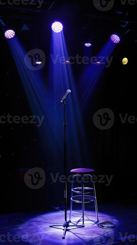 The spotlight is on an empty stool on a stage. photo