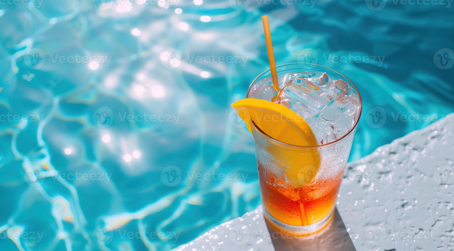 Refreshing summer cocktail with orange slice by the pool photo