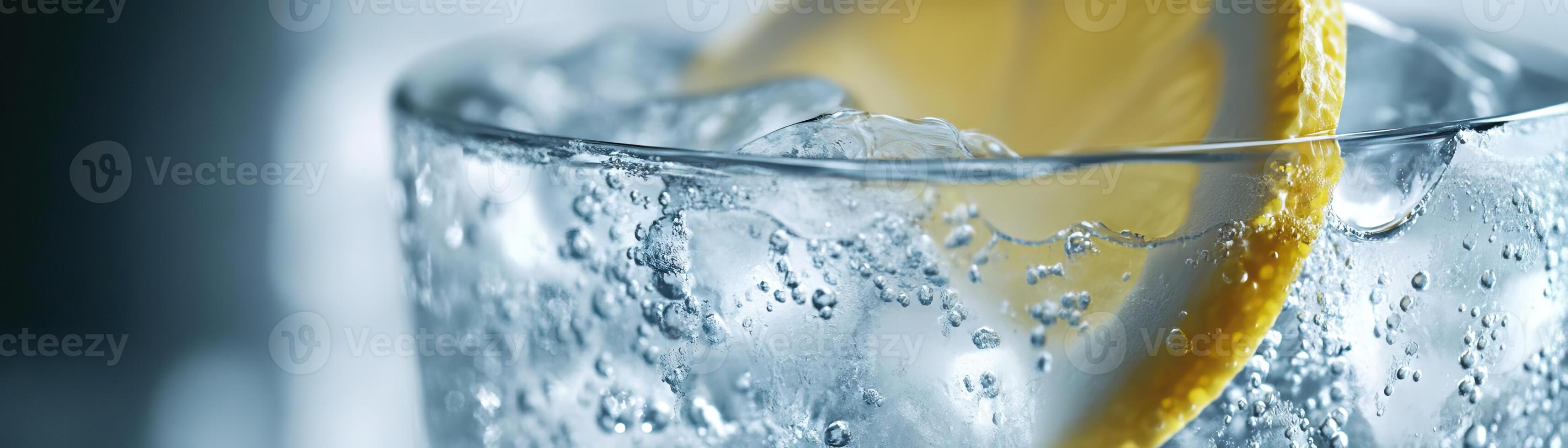 1 A detailed shot of a gin tonic, emphasizing the fizz and the ices clarity, set against a clean, neutral backdrop, extensive space on the right for copy photo