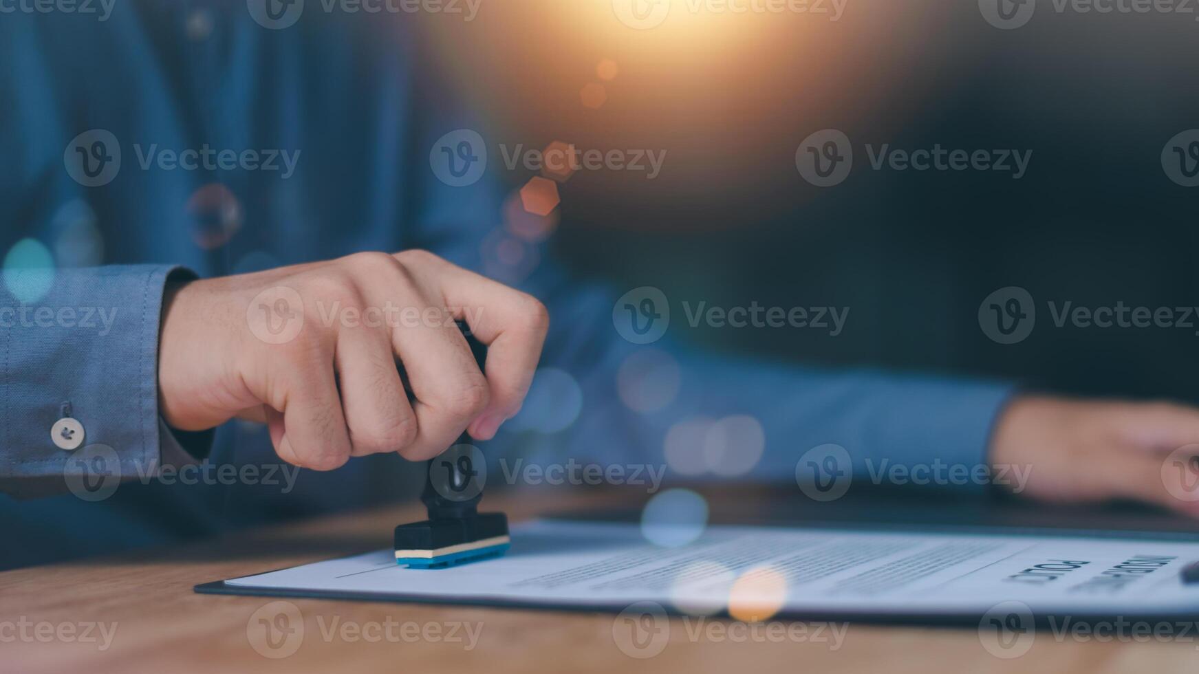 The concept of confirmation of a contract document or a warranty card ,Business Agreements and Approvals ,business contract signing ,Approval of checklist documents ,stamping in the contract photo