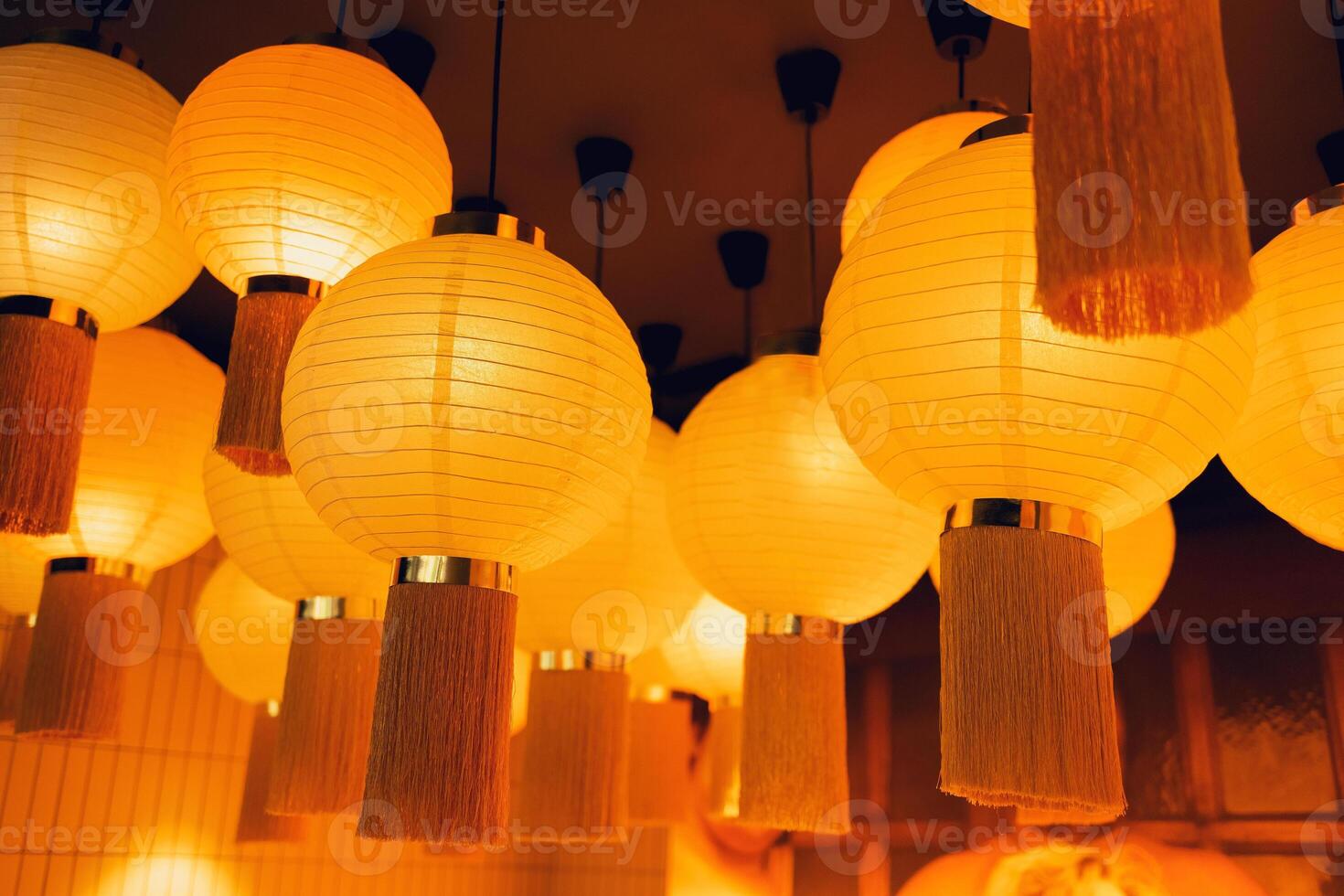 Red lanterns hanging in rows during chinese lunar new year photo