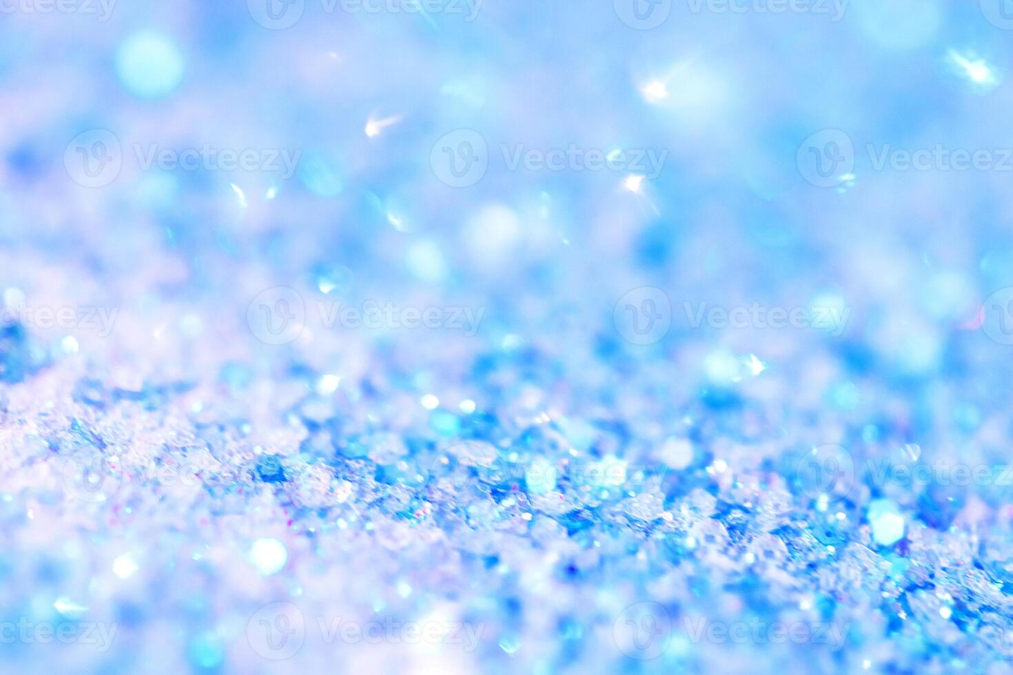Abstract blue background with sequins. A beautiful magical bokeh. photo