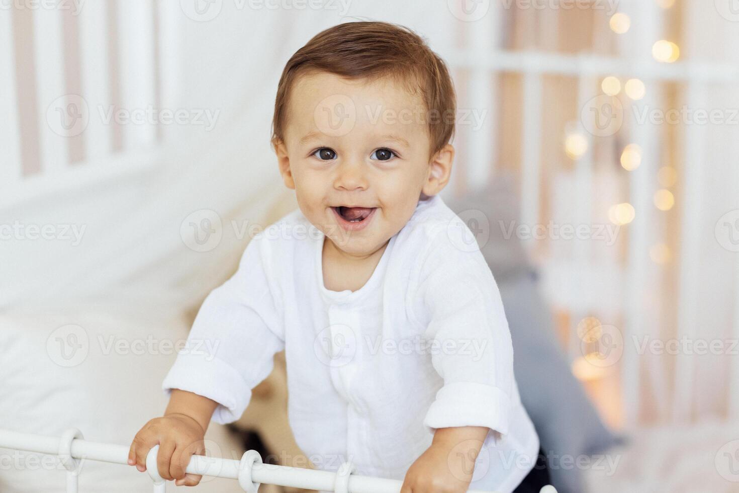 A child portrait of a cute toddler at home. photo