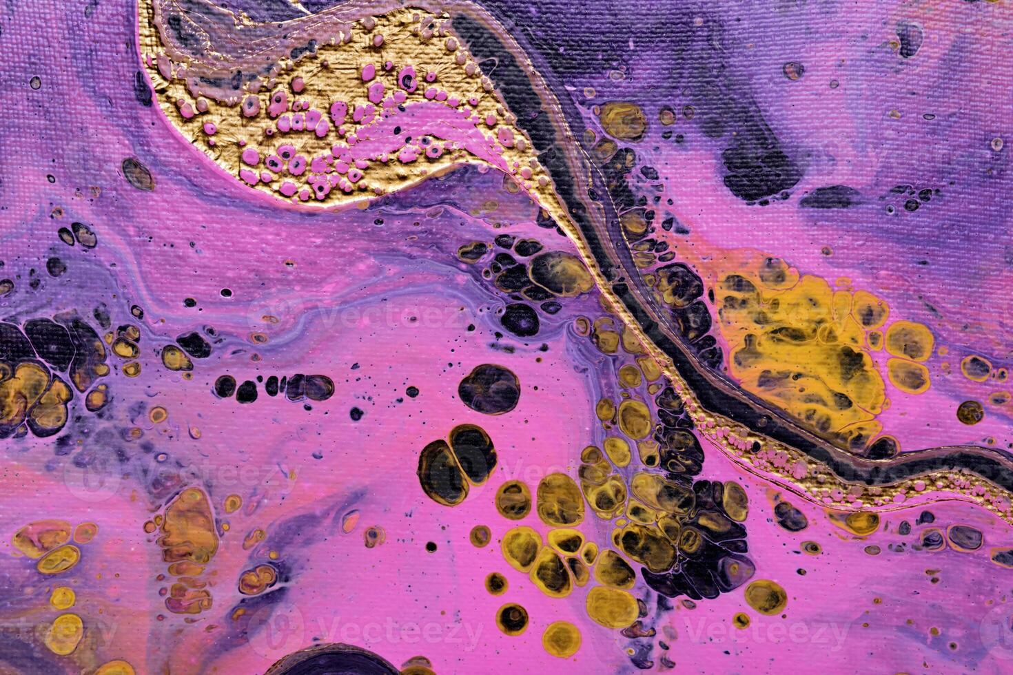 Acrylic Fluid Art. Yellow paint bubbles on pink waves. Liquid Gold Wave on canvas. Digital decor. Abstract stone background or texture photo