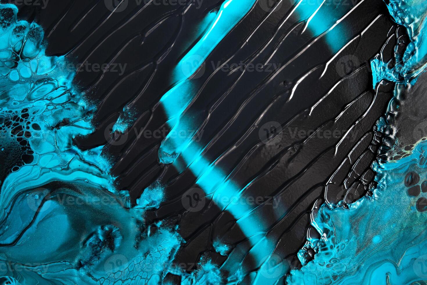 Fluid Art. Blue abstract wave swirls on black background. Marble effect background or texture photo