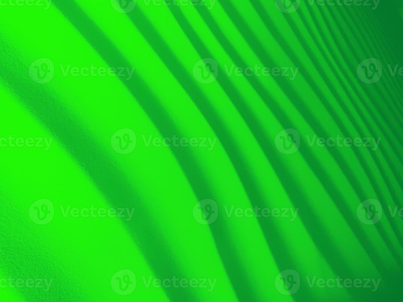 Abstract cyan backdrop with shadow and light alternating pattern. photo