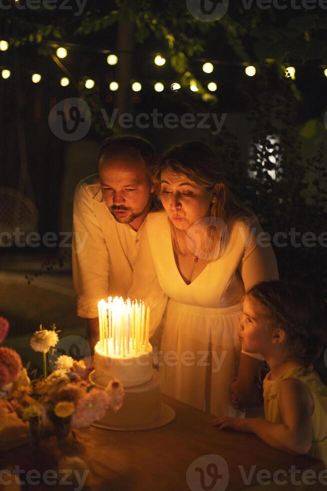 Wedding portrait of laughing newlyweds at night. photo