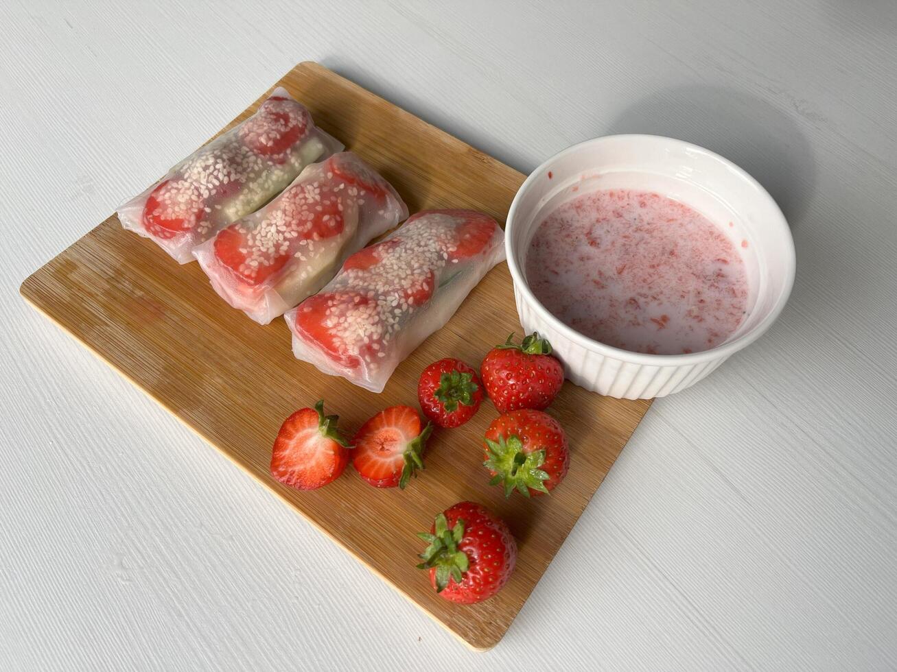 Vietnamese Fruit Spring Rolls are filled with a variety of fruit. These rolls could be served for lunch, dinner, or as finger food at the afternoon tea and pre-party. photo