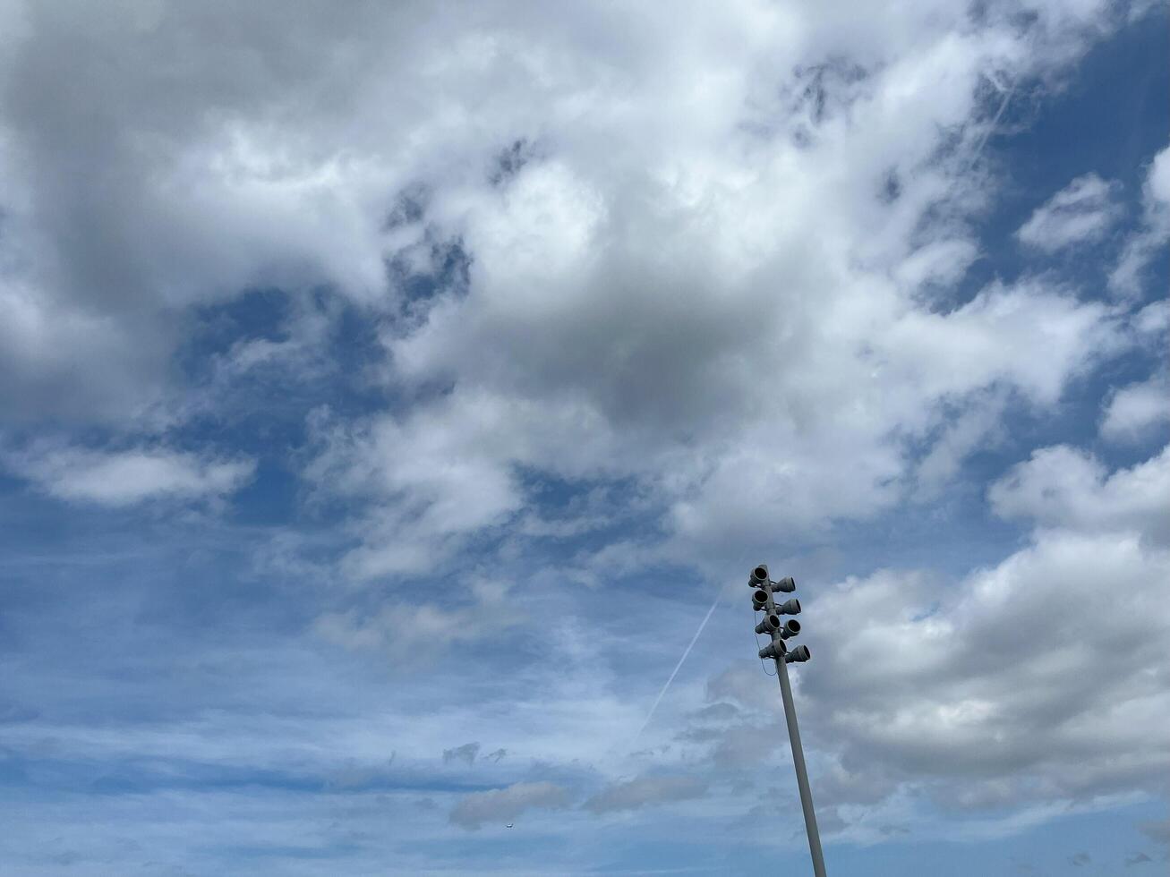 Sky with clouds with lights lamps. Nature background photo