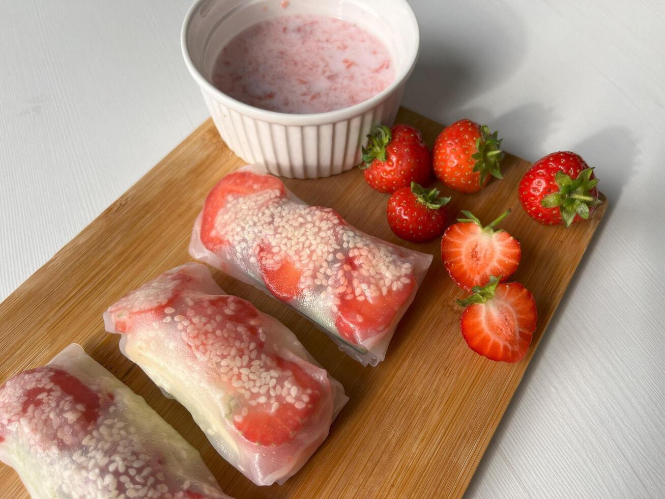 Vietnamese Fruit Spring Rolls are filled with a variety of fruit. These rolls could be served for lunch, dinner, or as finger food at the afternoon tea and pre-party. photo