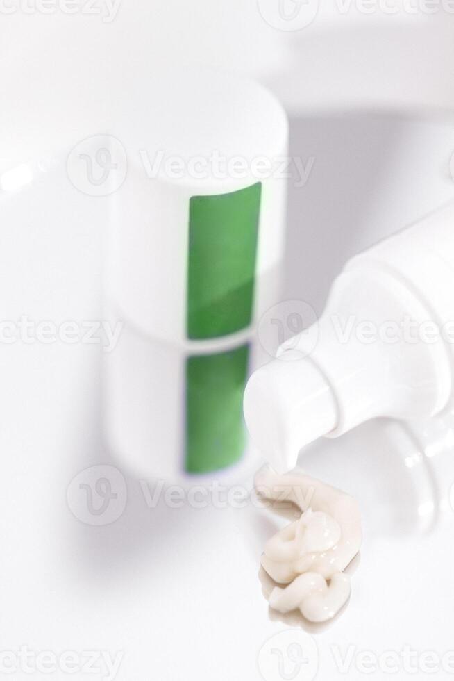 Extreme close up of mock up of tube of face or body cream. Texture cosmetics. photo