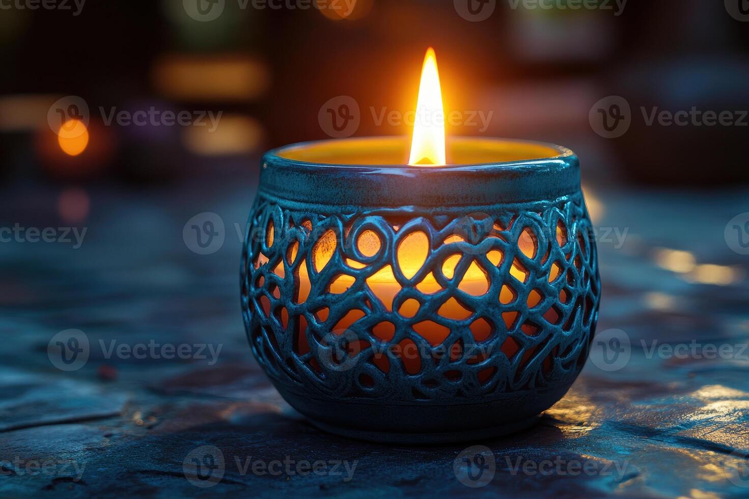 Burning candle creating a romantic atmosphere on a wooden table photo