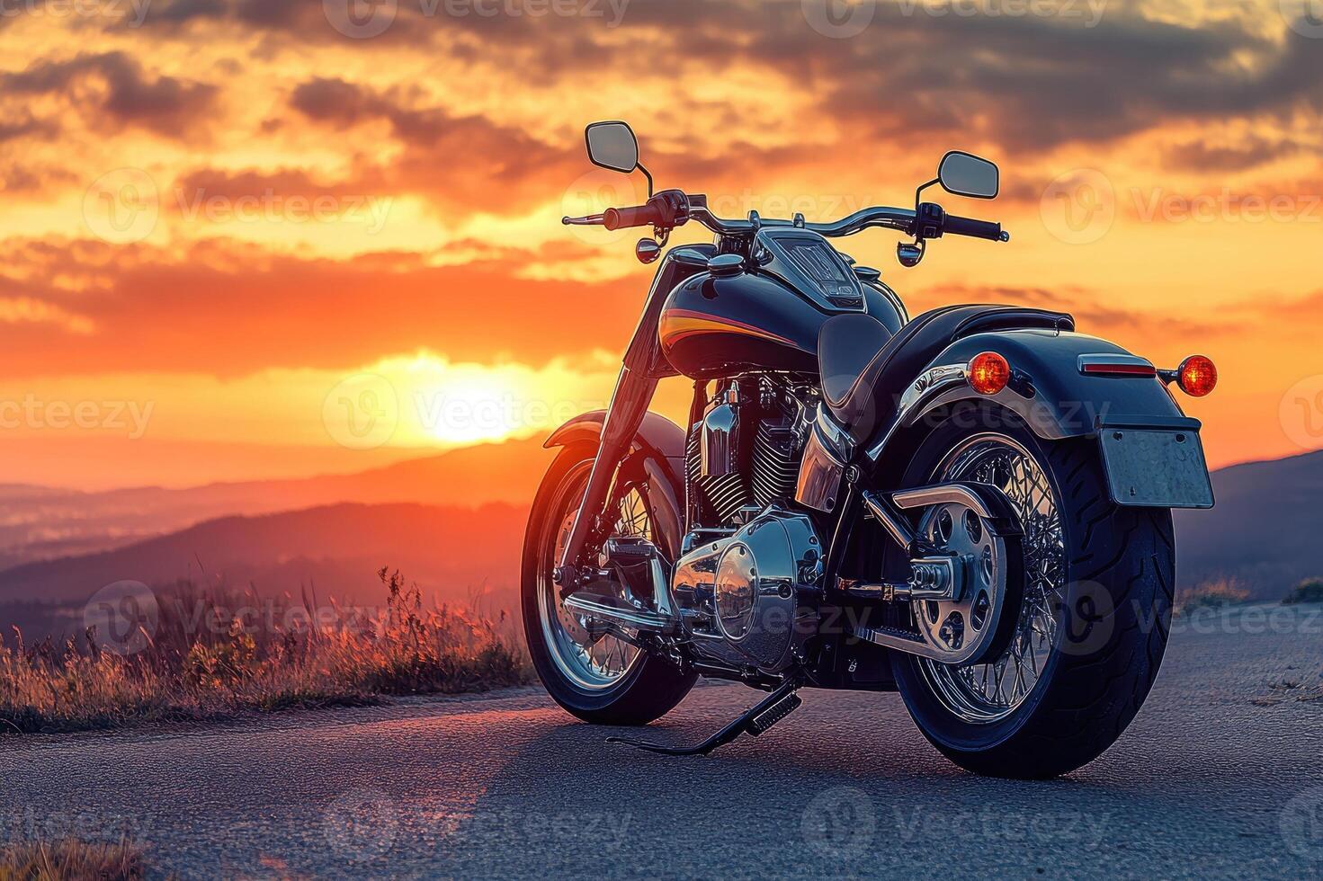 A stunning motorcycle parked on a rural road at sunset, highlighting its metallic parts against a dramatic sky, symbolizing freedom and adventure in a modern, artistic style. photo