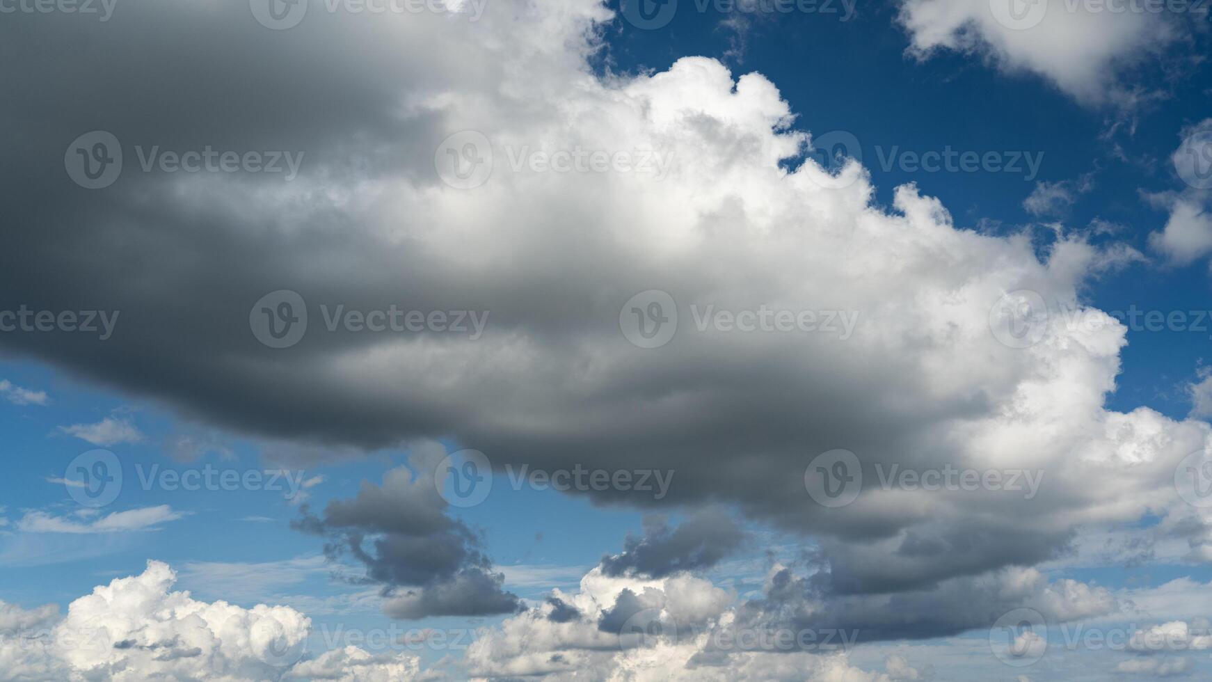 The clouds stretched in a band across the sky. Clouds over the city photo