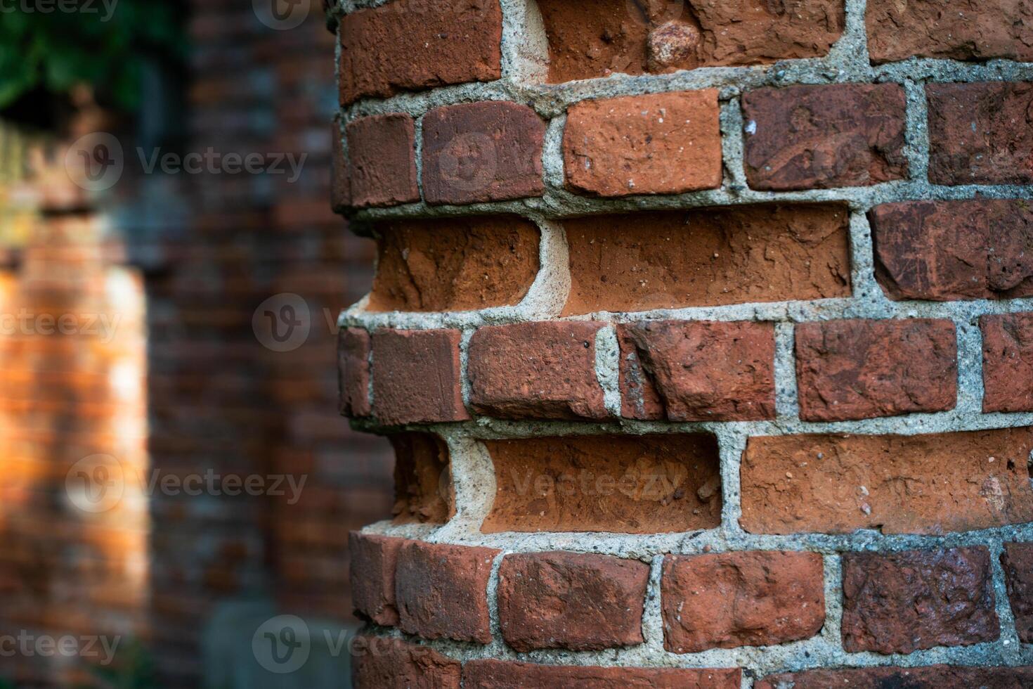 Old, broken bricks of the column photo