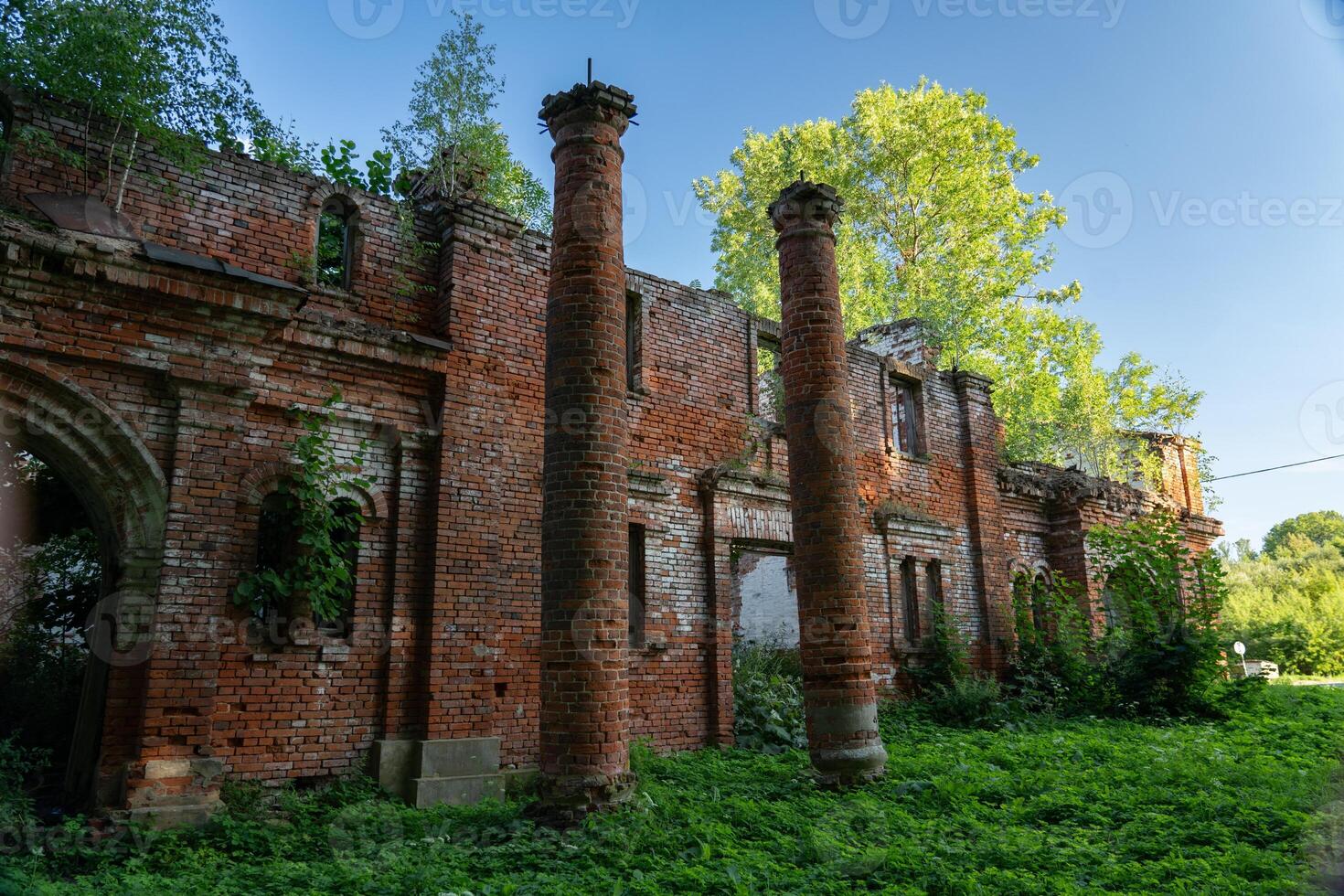 The columns of the destroyed red brick stable. 19th century buildings photo