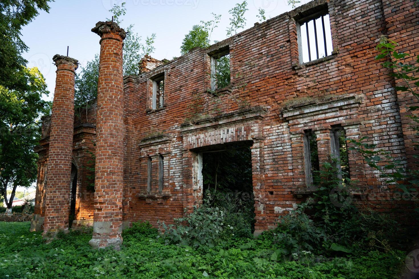 Brick columns in the old stable. 19th century buildings. photo