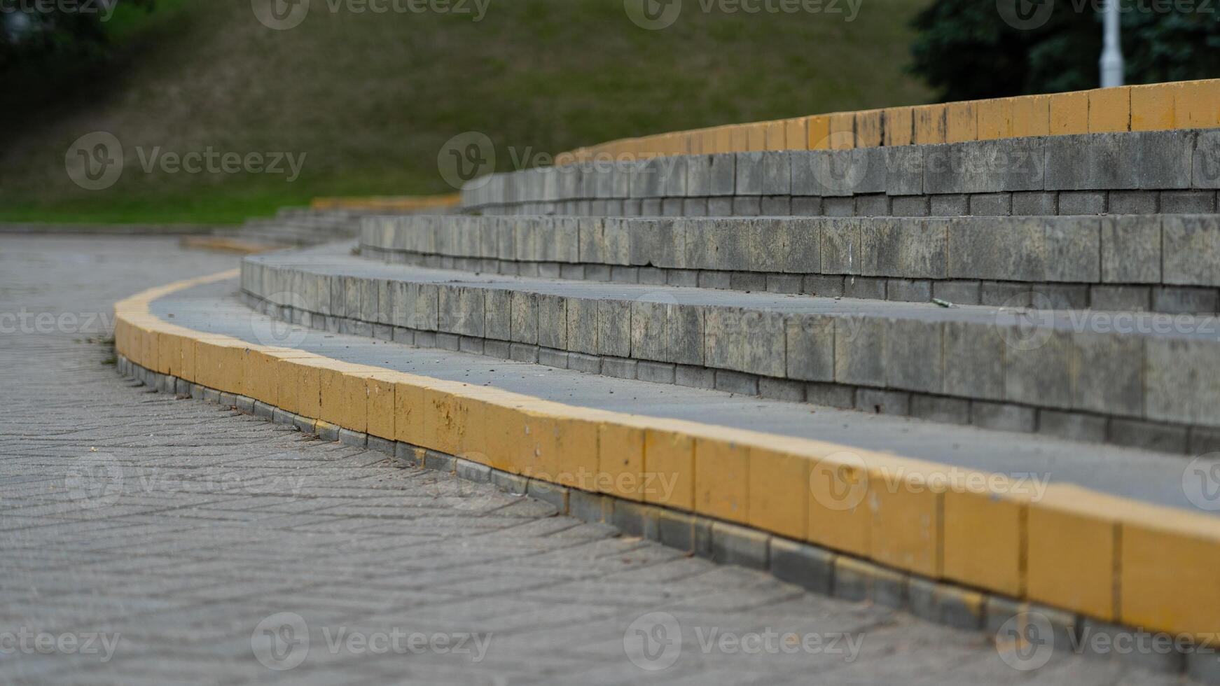 The steps in the park, the edges are painted yellow photo