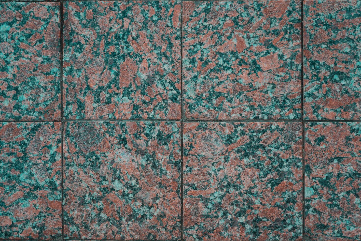 The paving slabs are square in shape. Square paving slabs photo