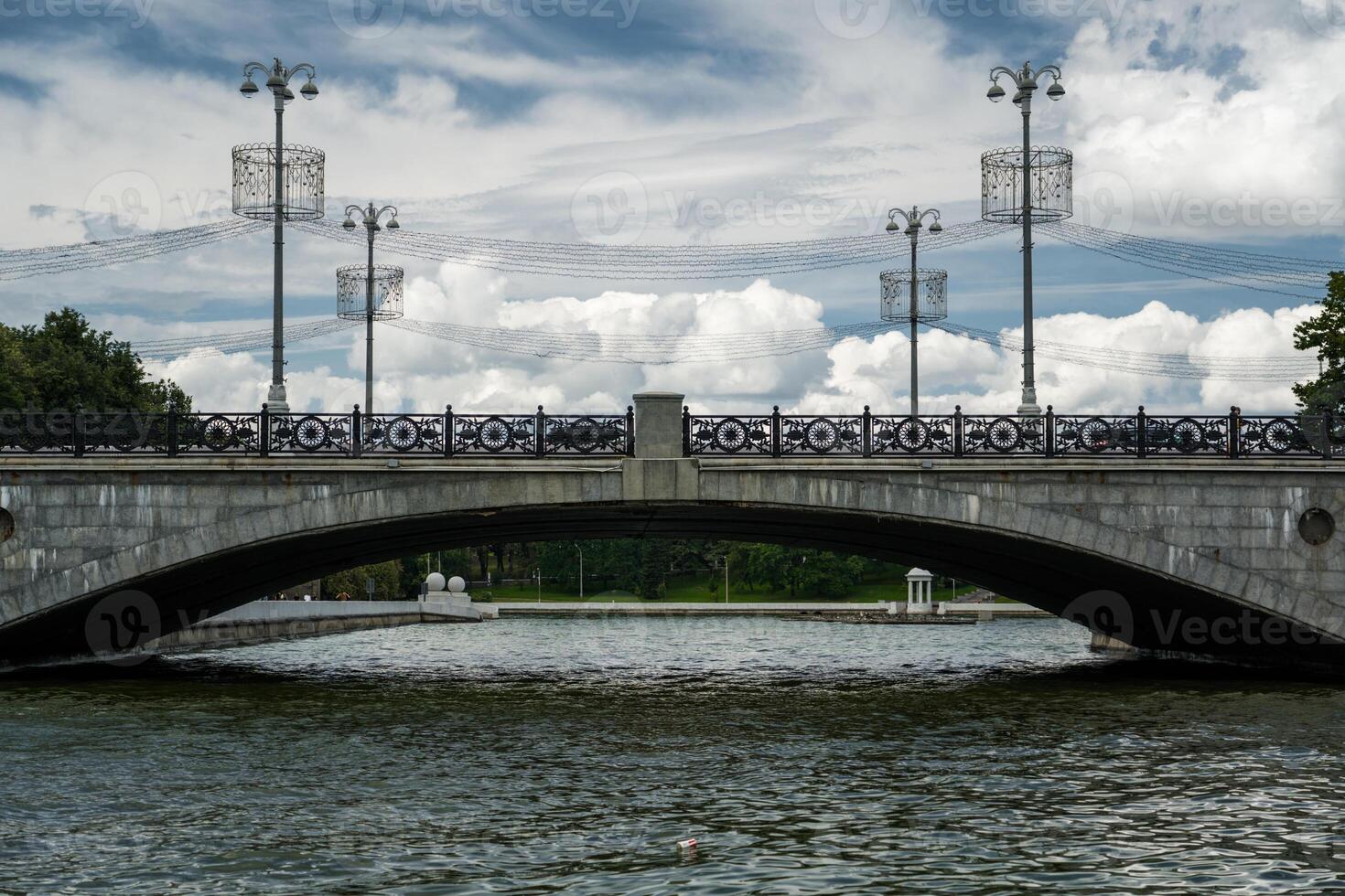 The bridge over the Svisloch River in Minsk. Cloudy sky photo