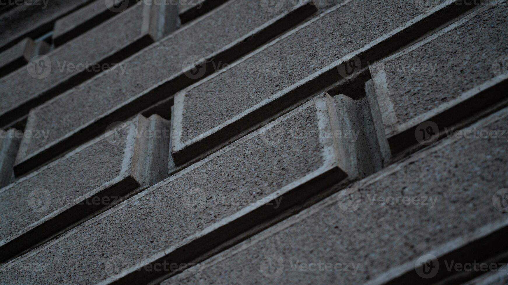 Facing tiles on the wall of the building. Brickwork of the walls photo