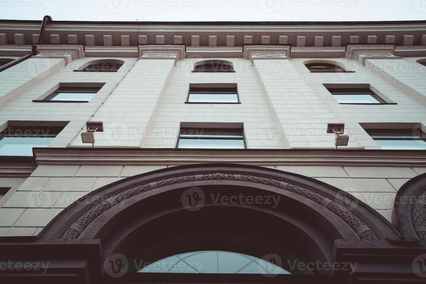 An old vintage building with a semicircular arch photo
