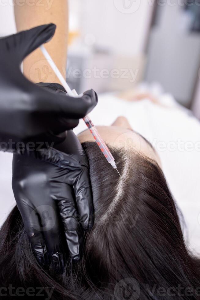 plasmolifting or PRP method point the introduction of the patient's own plasma photo