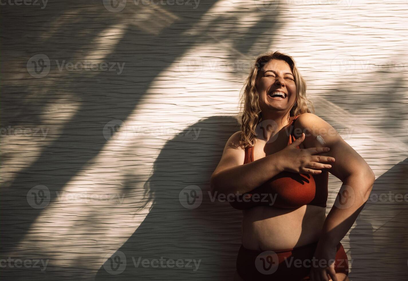 Female body in burgundy underwear. photo
